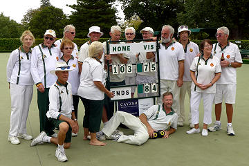 Successful competitive bowls side posing